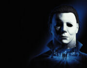 Official Halloween: The Game key art of Michael Myers looming over Haddonfield